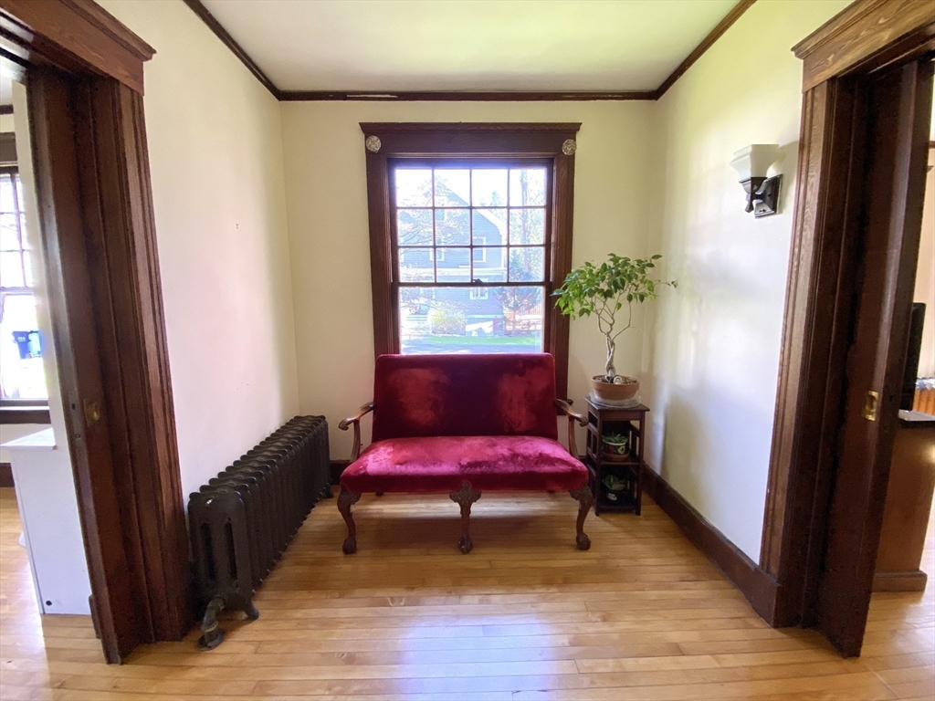 14 Nutting Avenue Amherst, MA 01002 - Photo 15 of 41 a bedroom with a bed window and chair