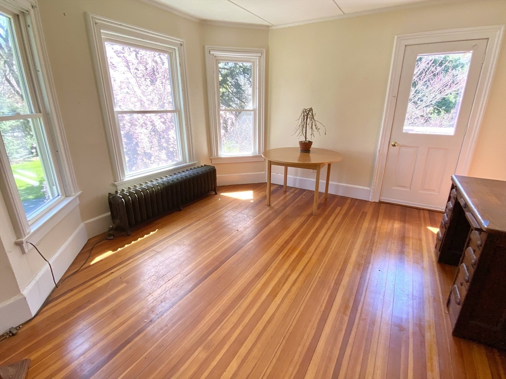 14 Nutting Avenue Amherst, MA 01002 - Photo 23 of 41 a living room with furniture and a wooden floor