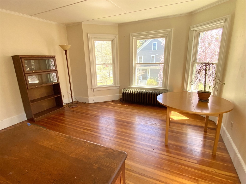 14 Nutting Avenue Amherst, MA 01002 - Photo 24 of 41 a view of a room with wooden floor and windows