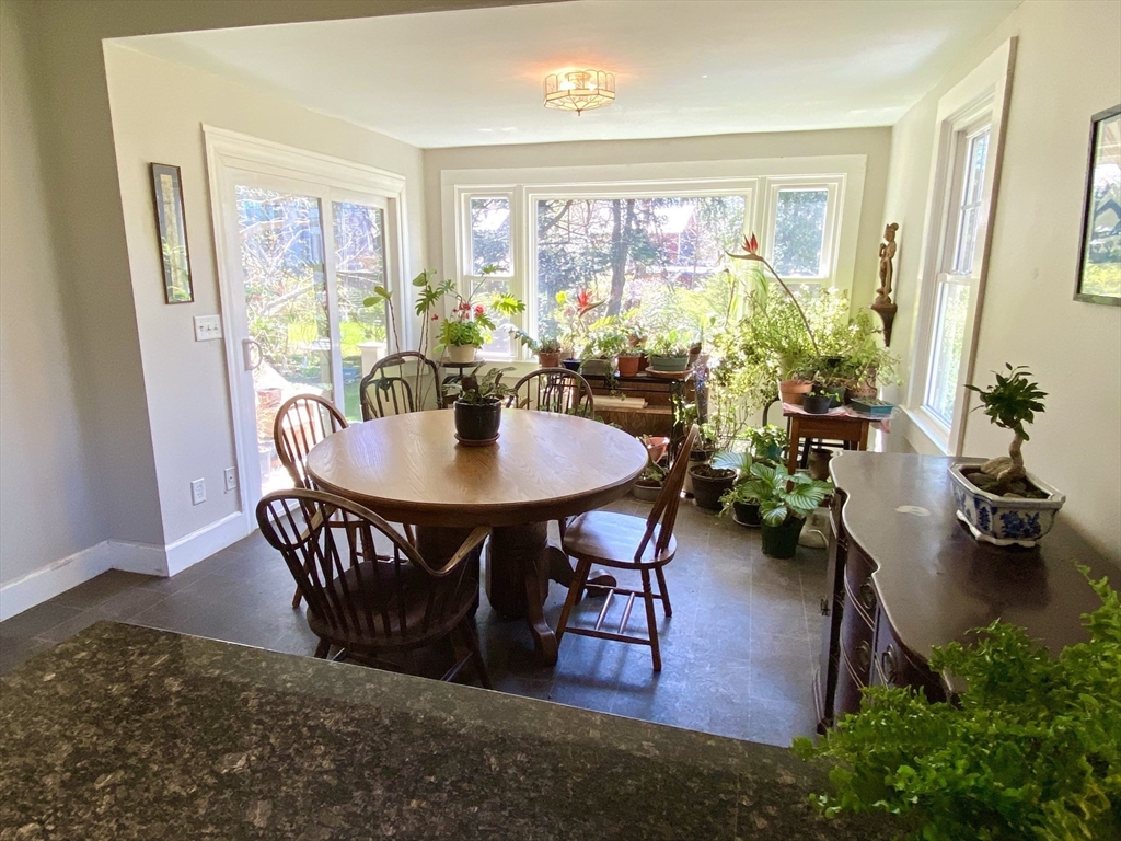 14 Nutting Avenue Amherst, MA 01002 - Photo 7 of 41 a view of a dining room with furniture window and wooden floor