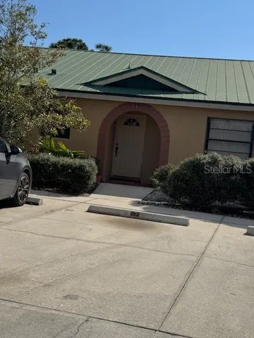 a view of backyard with green space