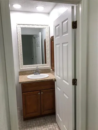 a bathroom with a shower and a toilet