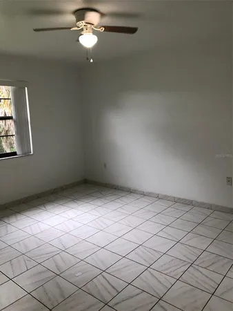 a bathroom with a vanity and a shower