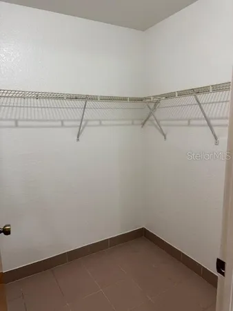 a view of a room with racks on the wall