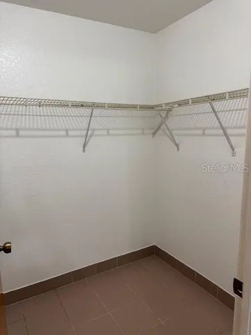 a view of a room with racks on the wall