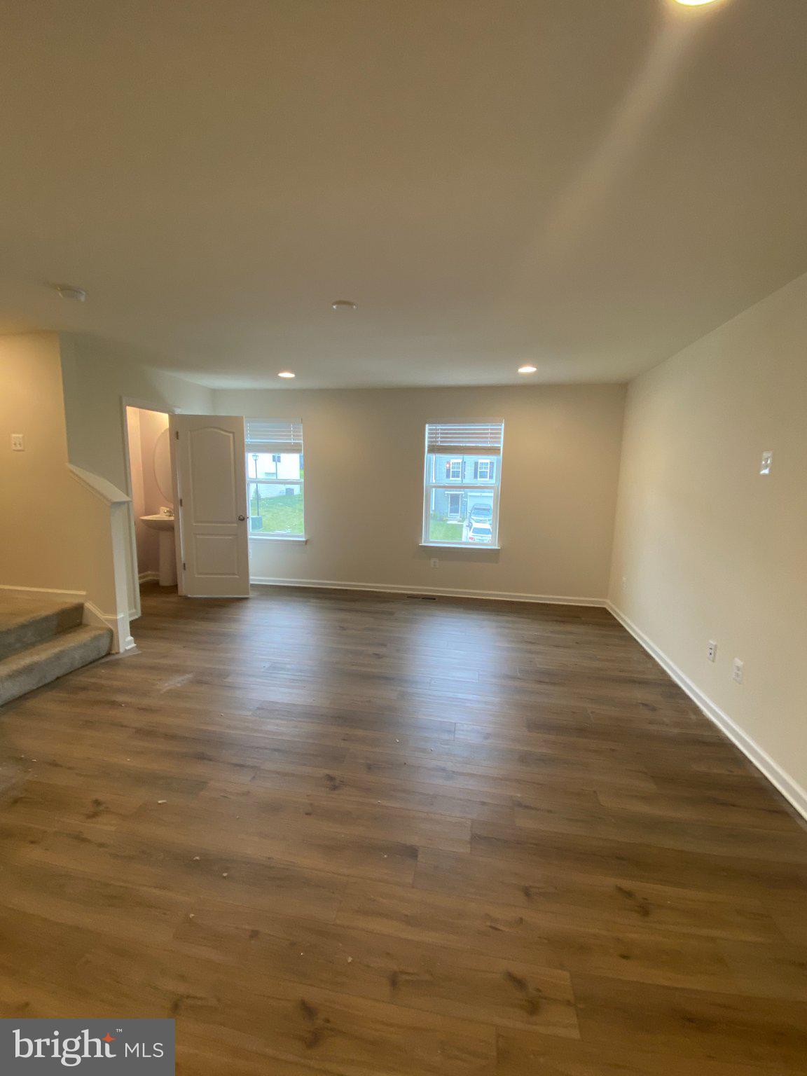 128 Tuxford Road Falling Waters, WV 25419 - Photo 13 of 27 Spacious, sunlit living area awaits.