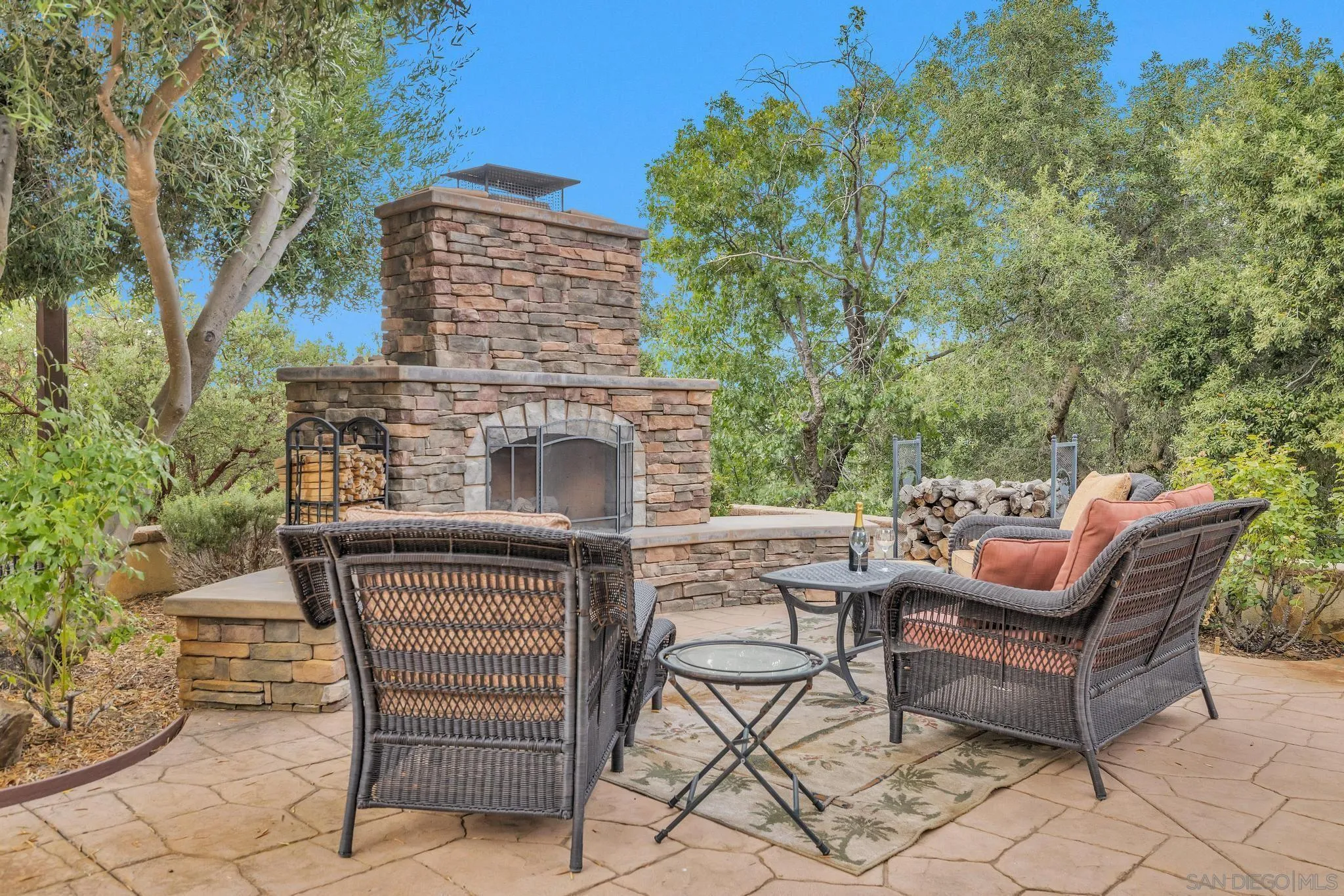 3839 Deer Lake Park Road Julian, CA 92036 - Photo 15 of 74 an outdoor sitting area with furniture and a fireplace