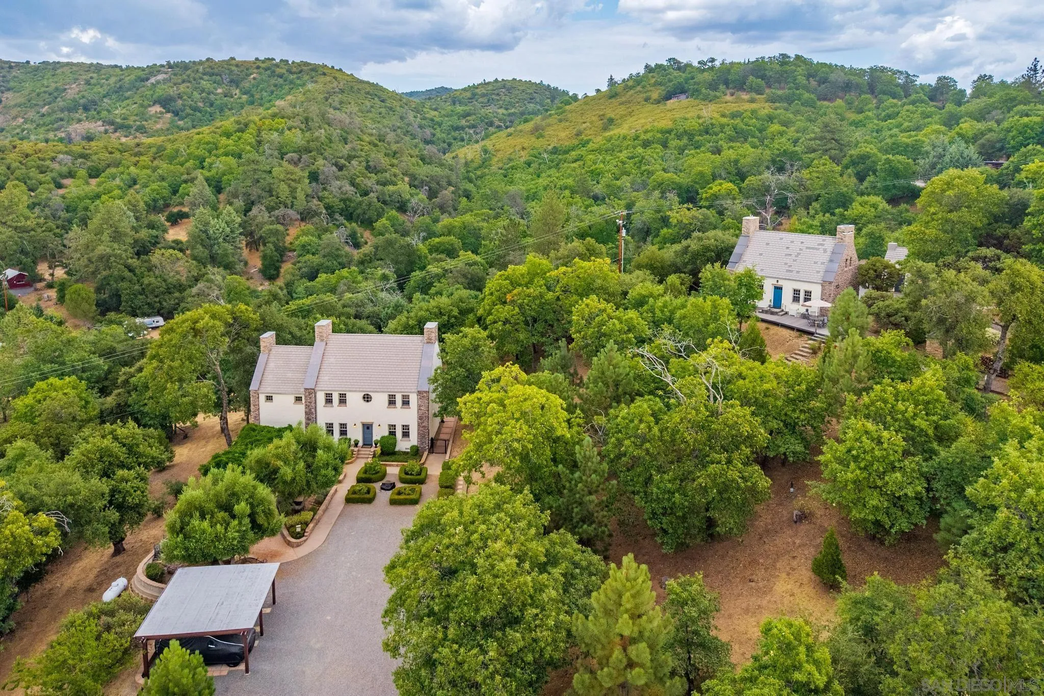 3839 Deer Lake Park Road Julian, CA 92036 - Photo 2 of 74 an aerial view of a house with a garden