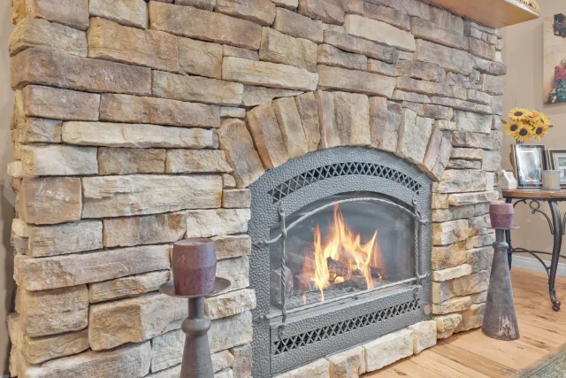 a kitchen with stainless steel appliances granite countertop a sink and a stove