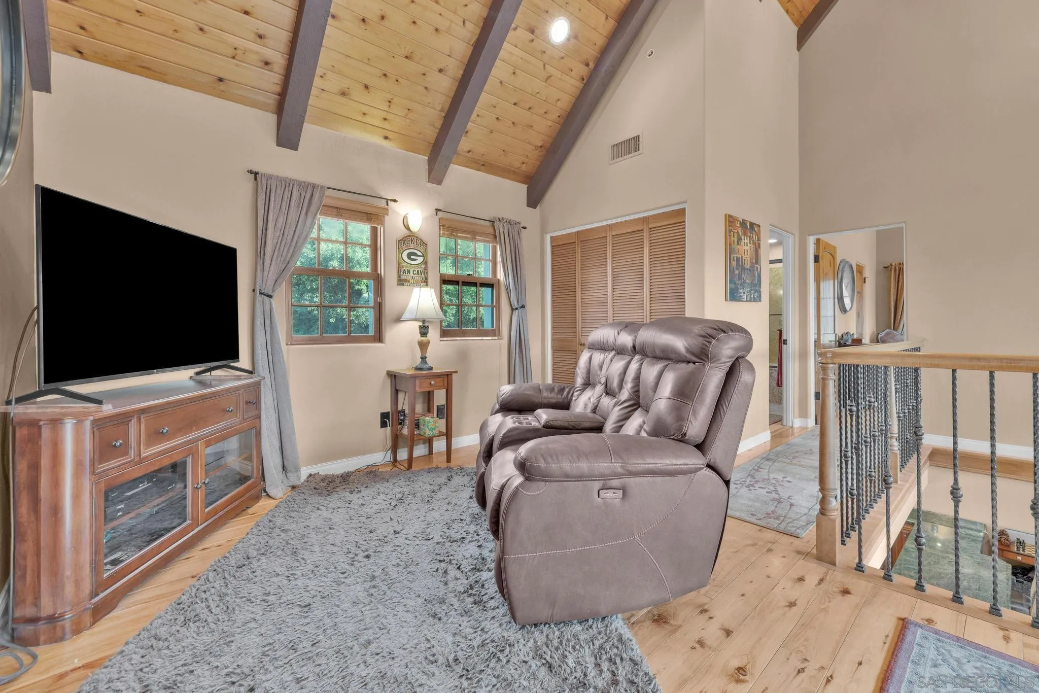 3839 Deer Lake Park Road Julian, CA 92036 - Photo 41 of 74 a living room with furniture and a flat screen tv