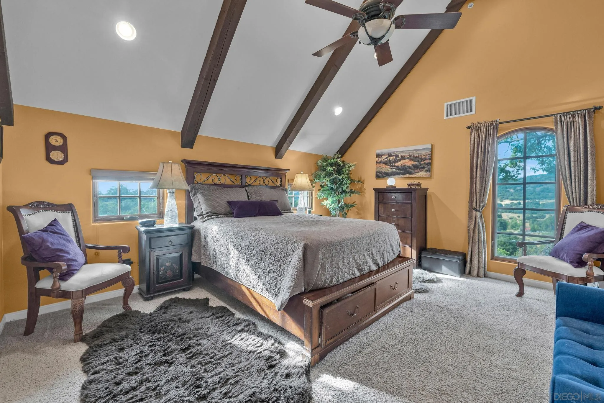 3839 Deer Lake Park Road Julian, CA 92036 - Photo 43 of 74 a bedroom with a bed a couch and dresser