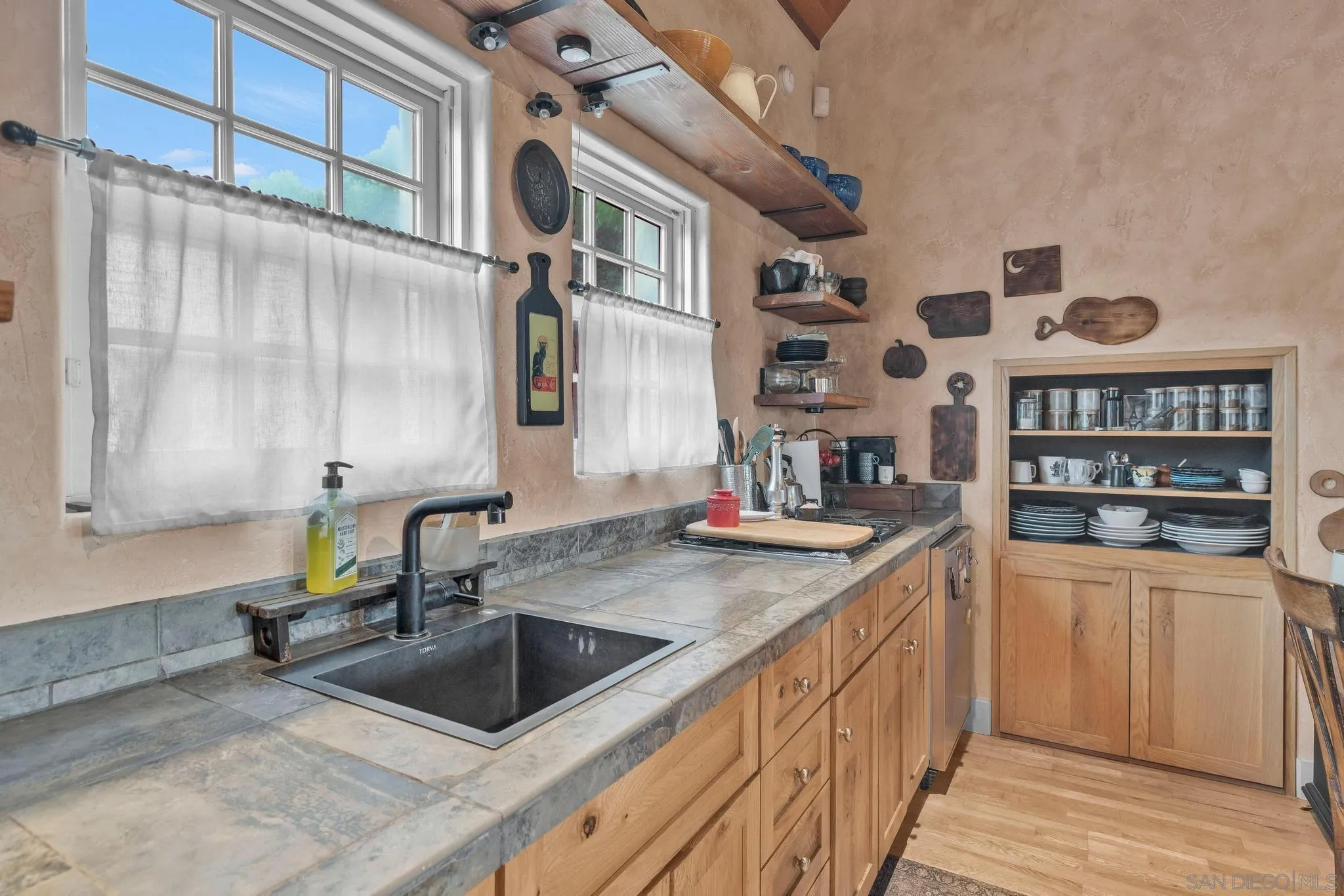 3839 Deer Lake Park Road Julian, CA 92036 - Photo 61 of 74 a kitchen with stainless steel appliances granite countertop a sink and a cabinets