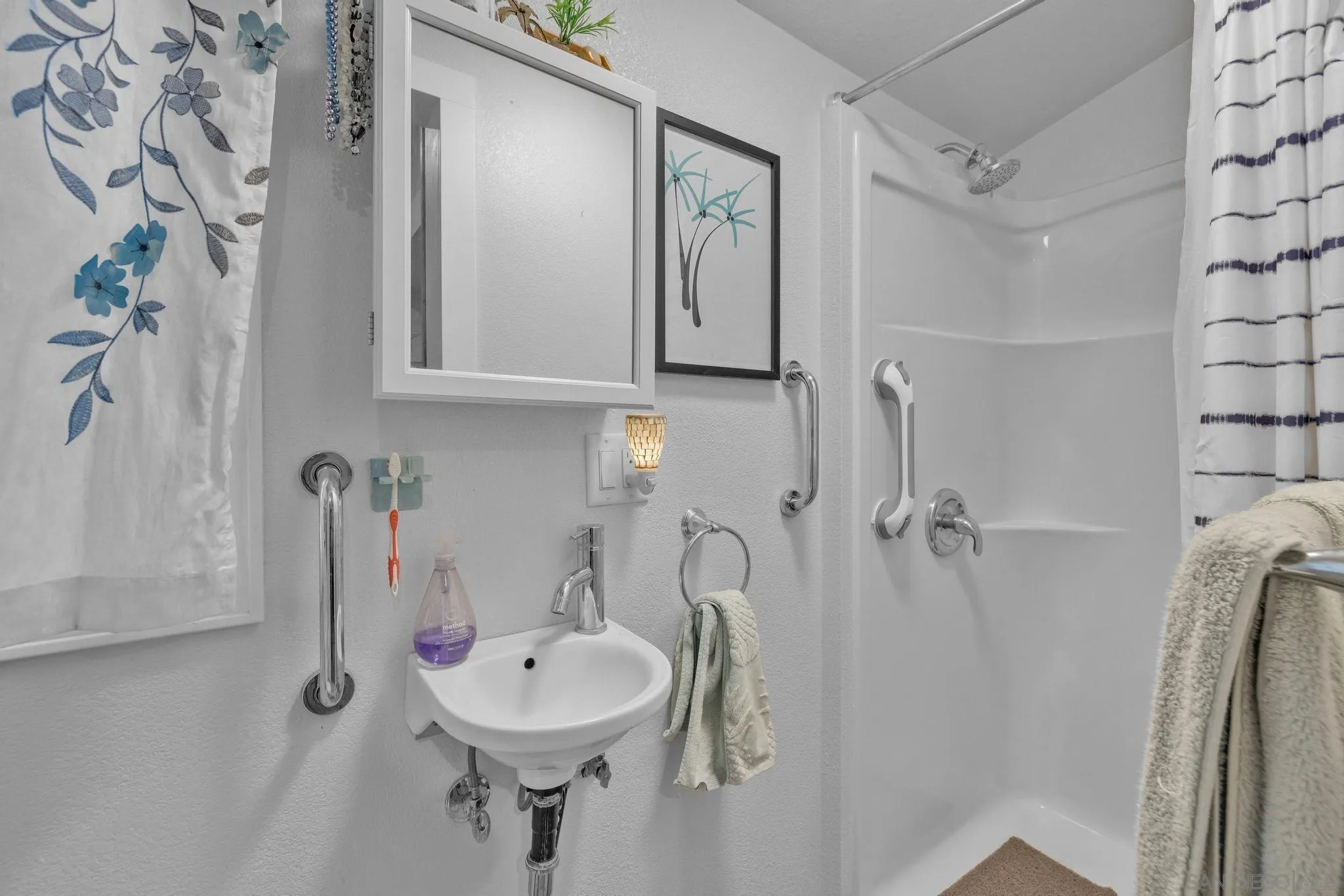 3839 Deer Lake Park Road Julian, CA 92036 - Photo 71 of 74 a bathroom with a sink and mirror