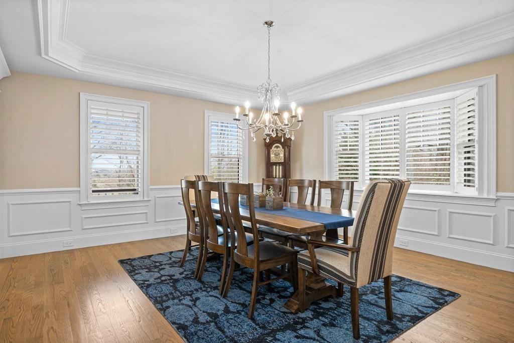 6 Johnson Road Winchester, MA 01890 - Photo 11 of 42 a view of a dining room with furniture window and wooden floor