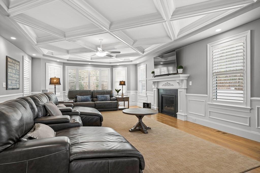 6 Johnson Road Winchester, MA 01890 - Photo 12 of 42 a living room with furniture and a fireplace