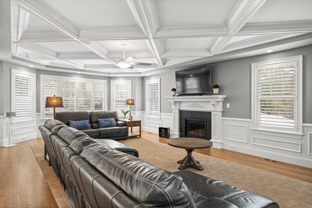 6 Johnson Road Winchester, MA 01890 - Photo 14 of 42 a living room with furniture and a fireplace