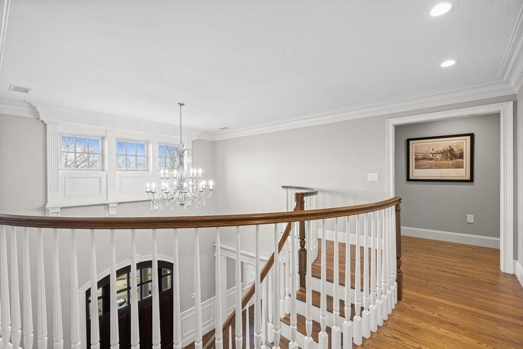 6 Johnson Road Winchester, MA 01890 - Photo 18 of 42 a view of a hallway with windows