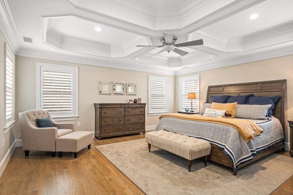 6 Johnson Road Winchester, MA 01890 - Photo 19 of 42 a spacious bedroom with a bed and a couch