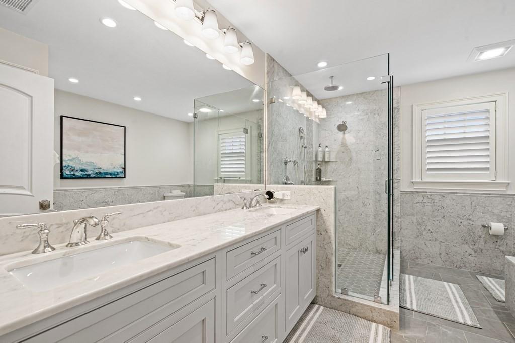 6 Johnson Road Winchester, MA 01890 - Photo 21 of 42 a bathroom with a double vanity sink mirror and double