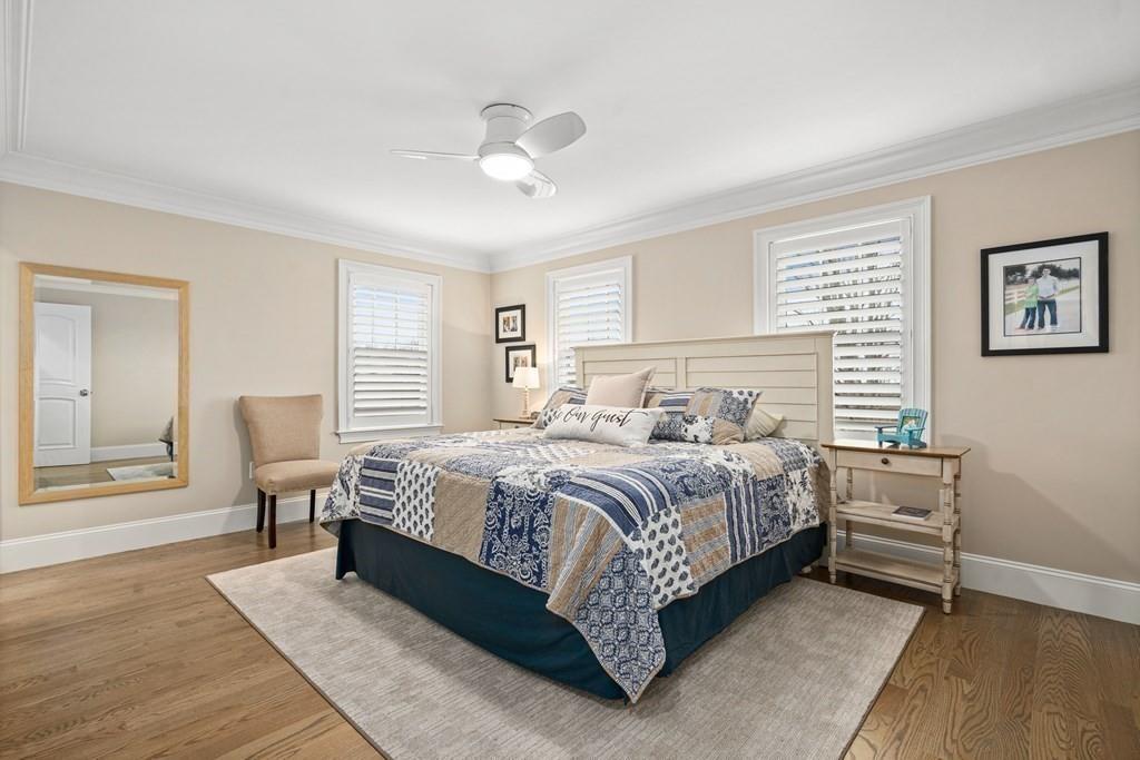 6 Johnson Road Winchester, MA 01890 - Photo 22 of 42 a bedroom with a large bed and a table