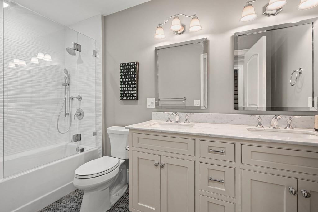 6 Johnson Road Winchester, MA 01890 - Photo 23 of 42 a bathroom with a sink a toilet and shower