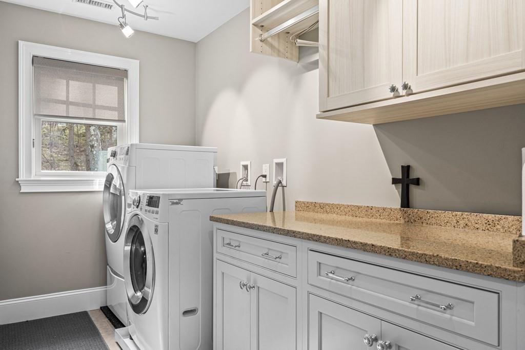 6 Johnson Road Winchester, MA 01890 - Photo 27 of 42 a view of a kitchen with washer and dryer