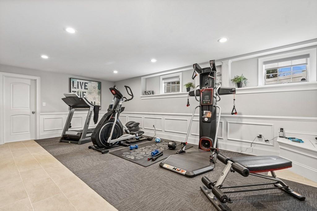 6 Johnson Road Winchester, MA 01890 - Photo 32 of 42 a view of a room with gym equipment