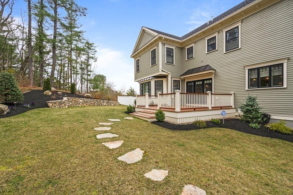 6 Johnson Road Winchester, MA 01890 - Photo 33 of 42 a view of a house with backyard and sitting area