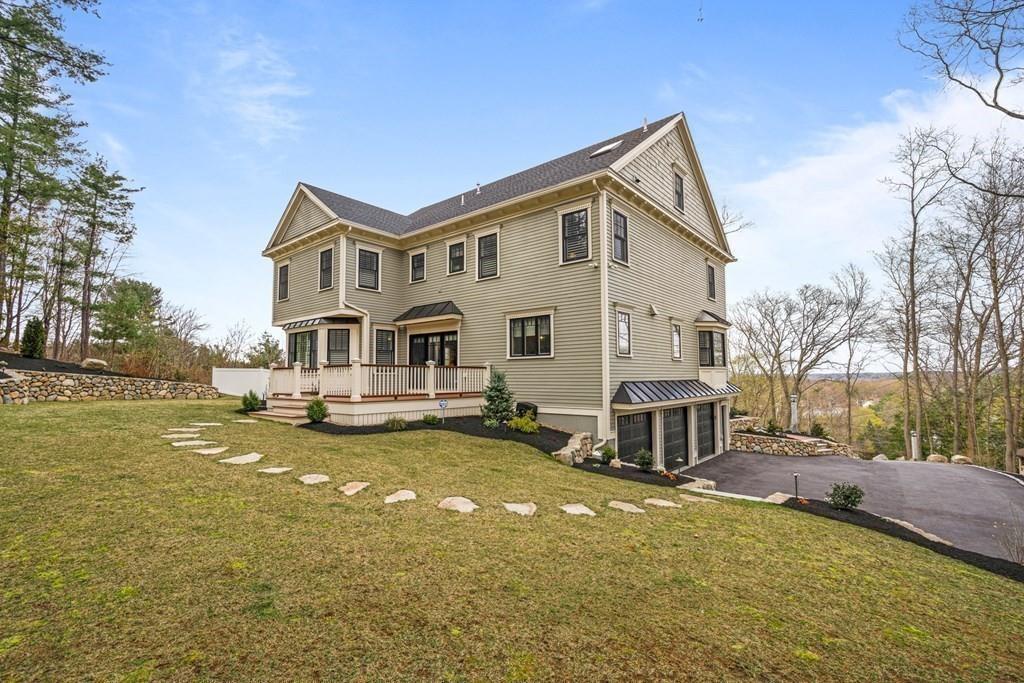 6 Johnson Road Winchester, MA 01890 - Photo 35 of 42 a view of a house with pool and a yard