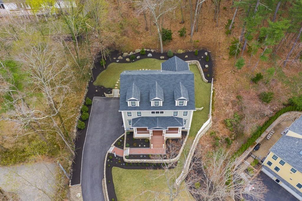 6 Johnson Road Winchester, MA 01890 - Photo 40 of 42 an aerial view of a house with a yard