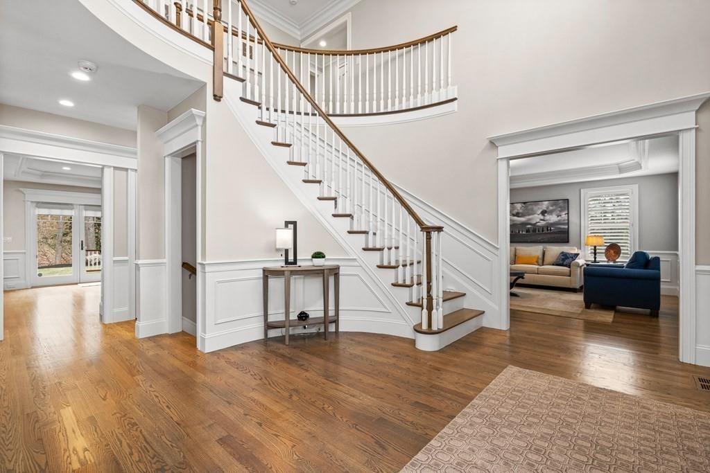 6 Johnson Road Winchester, MA 01890 - Photo 5 of 42 a view of entryway and hall with wooden floor