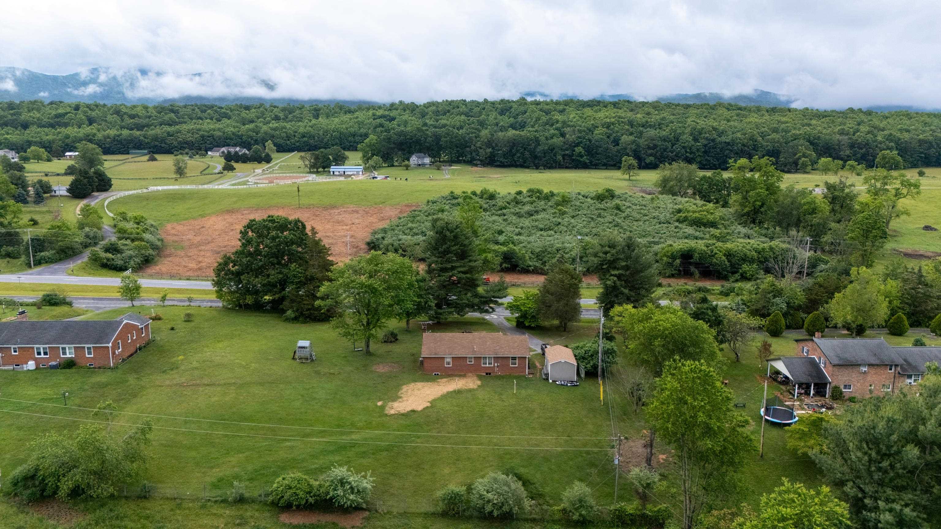 7827 Lee Highway Raphine, VA 24472 - Photo 59 of 62 a view of a lake with houses in the back