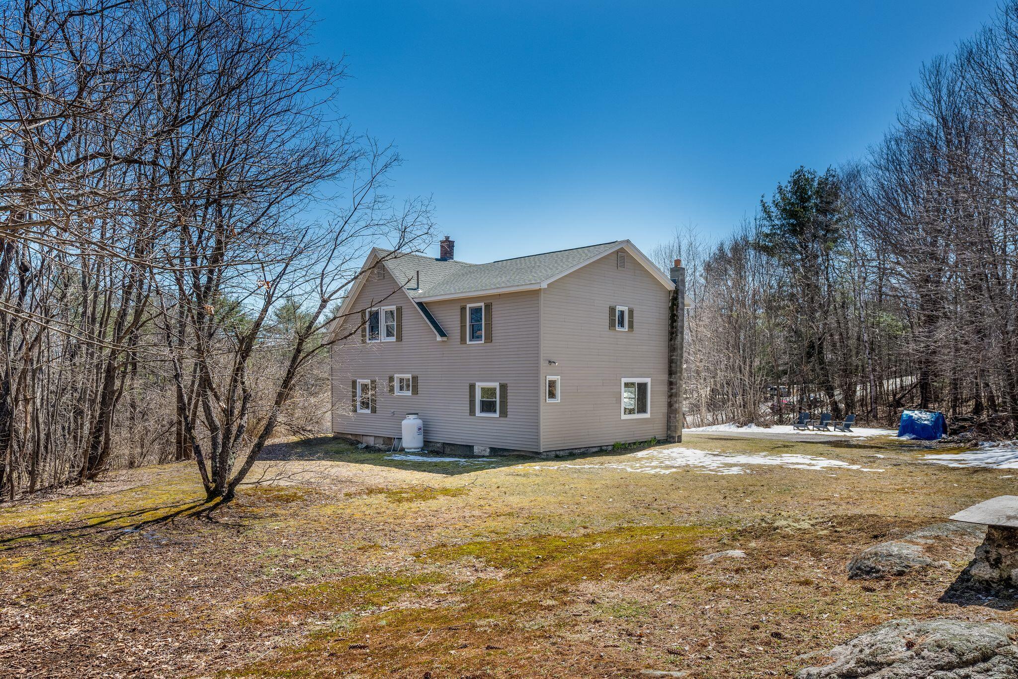 243 Trapp Road Auburn, ME 04210 - Photo 6 of 39 Side/rear view of house