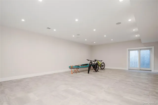 an empty room with painted wall and couch