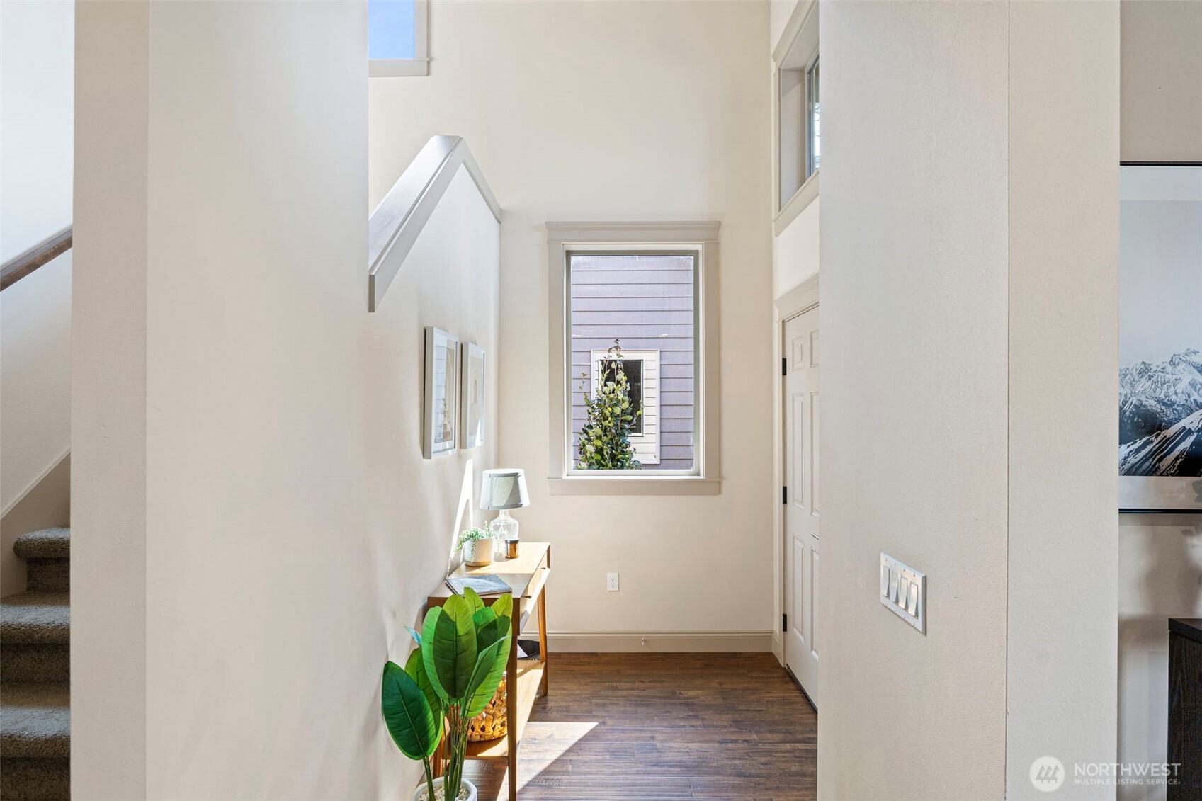 553 Southeast Andrews Street, Unit B Issaquah, WA 98027 - Photo 4 of 28 a view of entryway with wooden floor