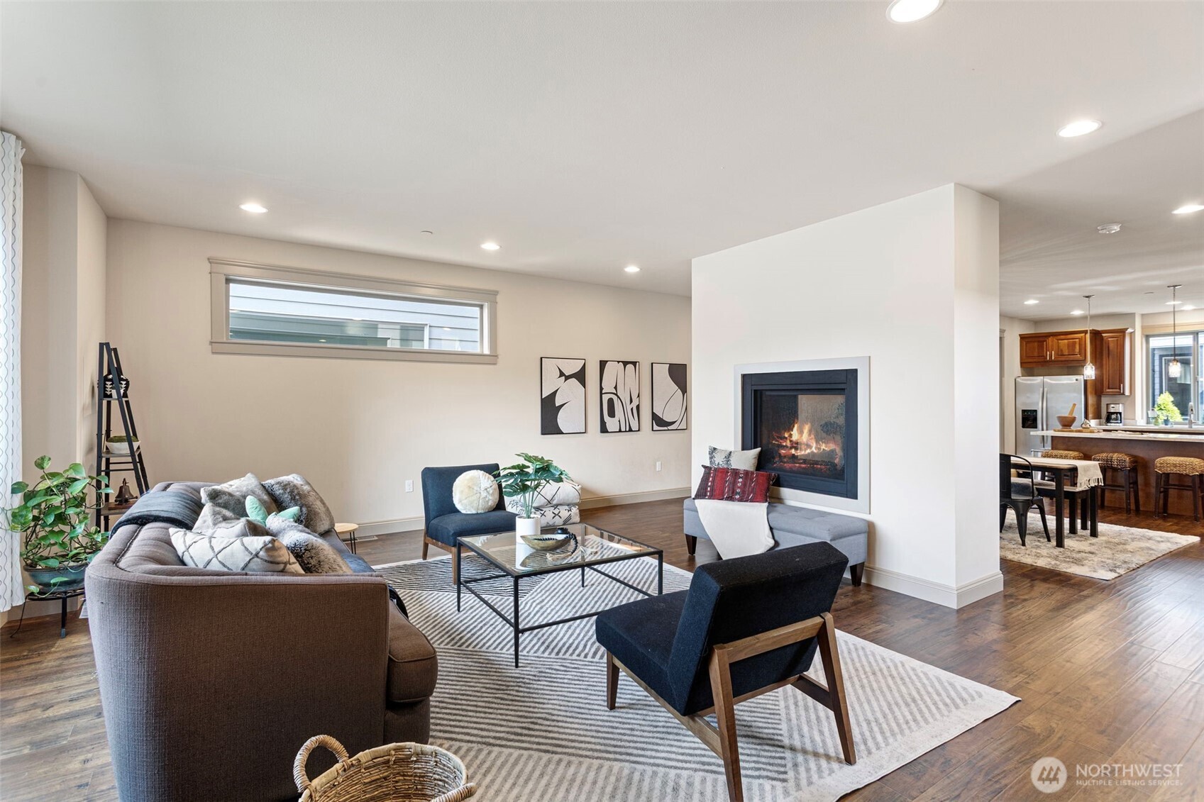 553 Southeast Andrews Street, Unit B Issaquah, WA 98027 - Photo 7 of 28 a living room with furniture and wooden floor