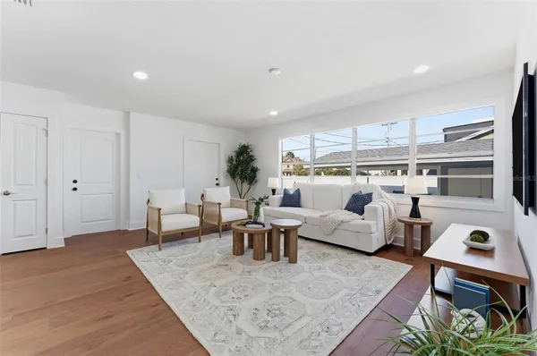 a living room with furniture and a table