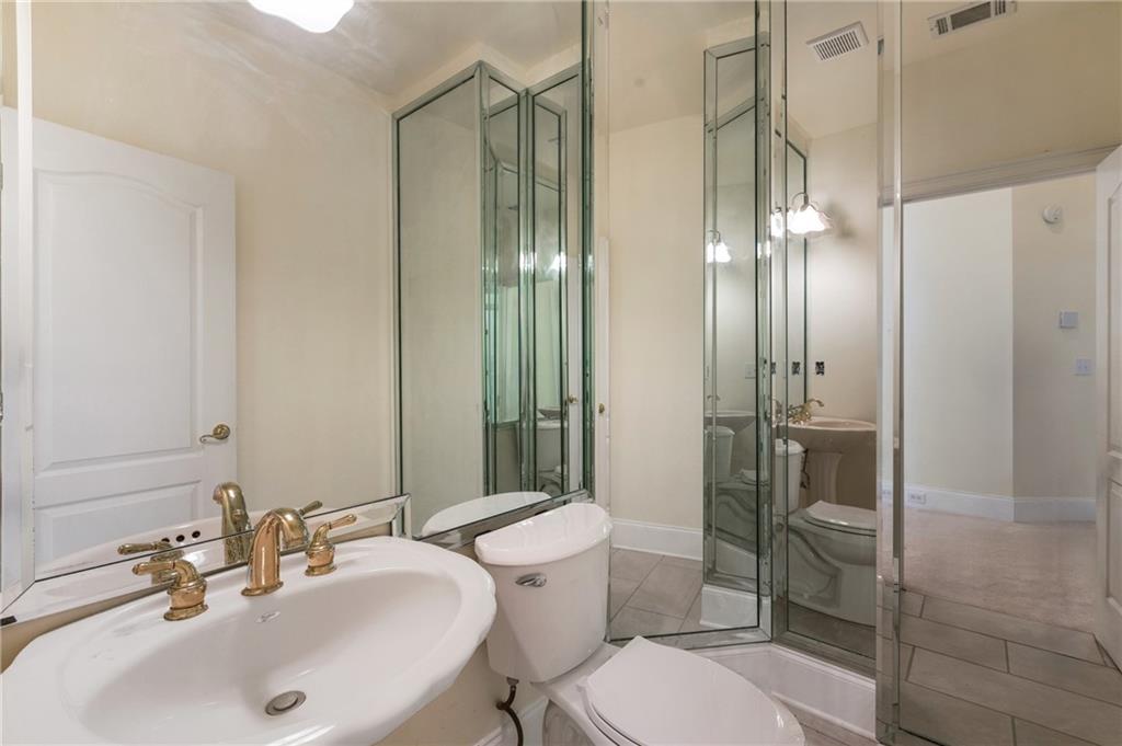 7249 Confederate Lane Villa Rica, GA 30180 - Photo 30 of 49 a bathroom with a sink toilet and shower