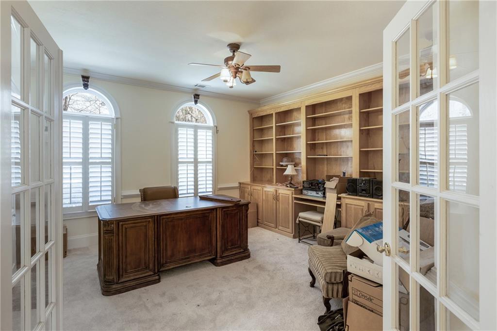 7249 Confederate Lane Villa Rica, GA 30180 - Photo 31 of 49 a view of a workspace with furniture and windows