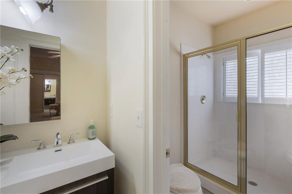 7249 Confederate Lane Villa Rica, GA 30180 - Photo 39 of 49 a bathroom with a sink and a mirror