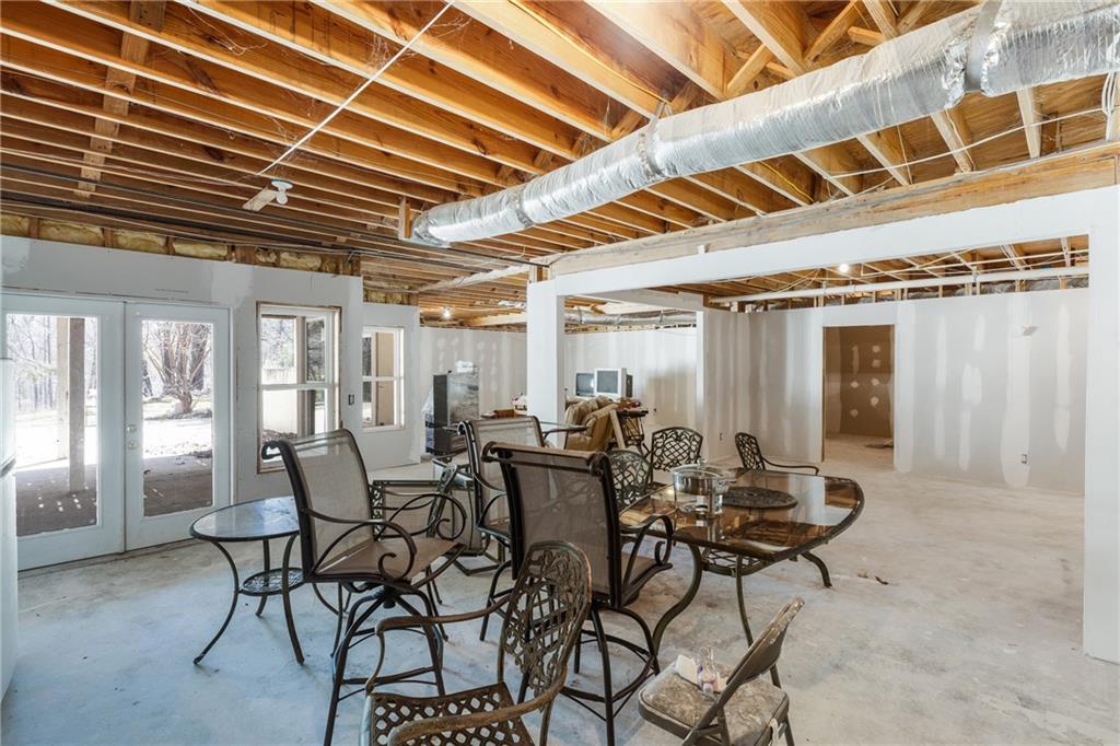 7249 Confederate Lane Villa Rica, GA 30180 - Photo 41 of 49 a view of a dinning table and chairs in patio