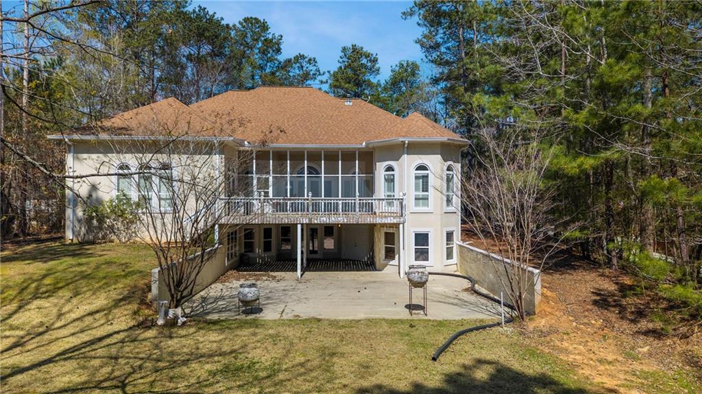 7249 Confederate Lane Villa Rica, GA 30180 - Photo 44 of 49 a front view of a house with a yard