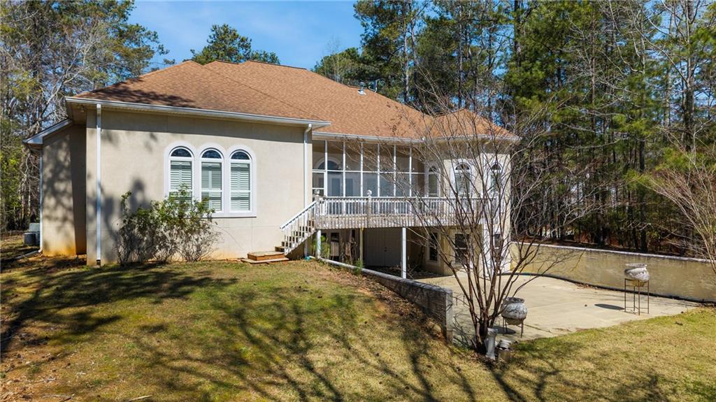 7249 Confederate Lane Villa Rica, GA 30180 - Photo 46 of 49 a front view of a house with a yard