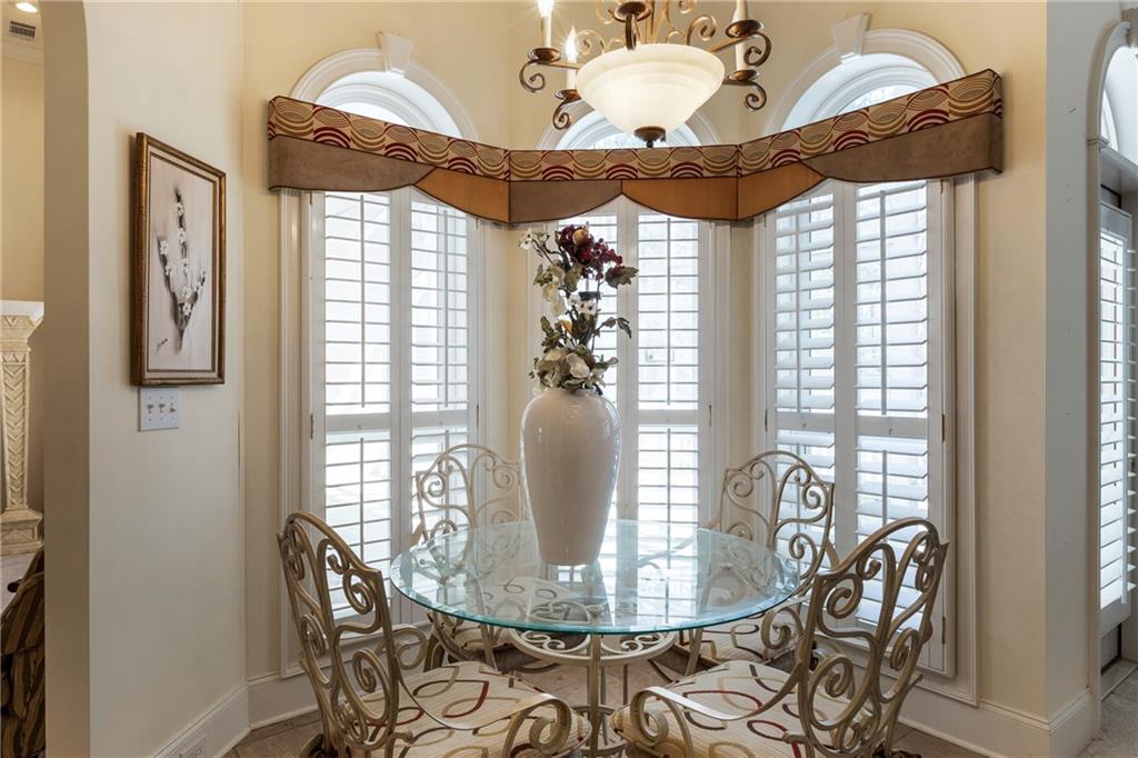7249 Confederate Lane Villa Rica, GA 30180 - Photo 10 of 49 a view of a dining room with furniture and chandelier