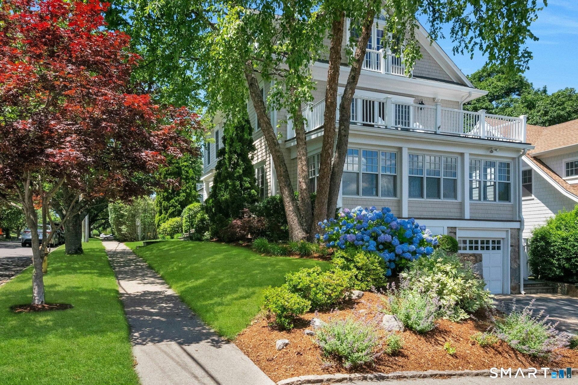 52 Chesterfield Road Stamford, CT 06902 - Photo 39 of 40 Side of house with professional landscaping