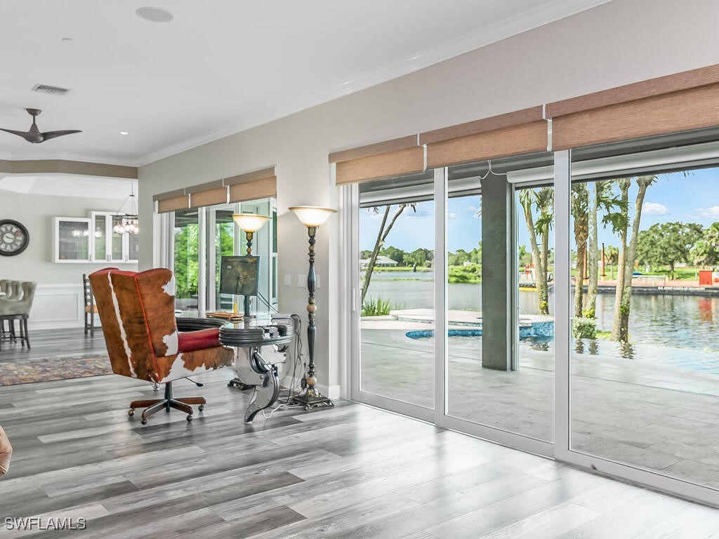 16410 Oakview Circle Alva, FL 33920 - Photo 15 of 39 a view of a livingroom with workspace and glass windows
