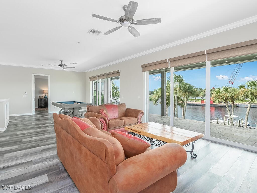 16410 Oakview Circle Alva, FL 33920 - Photo 18 of 39 a living room with furniture and a large window