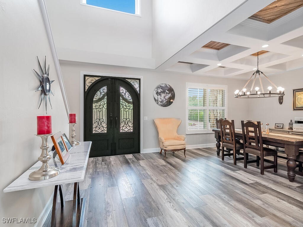 16410 Oakview Circle Alva, FL 33920 - Photo 5 of 39 a view of a dining room with furniture and wooden floor