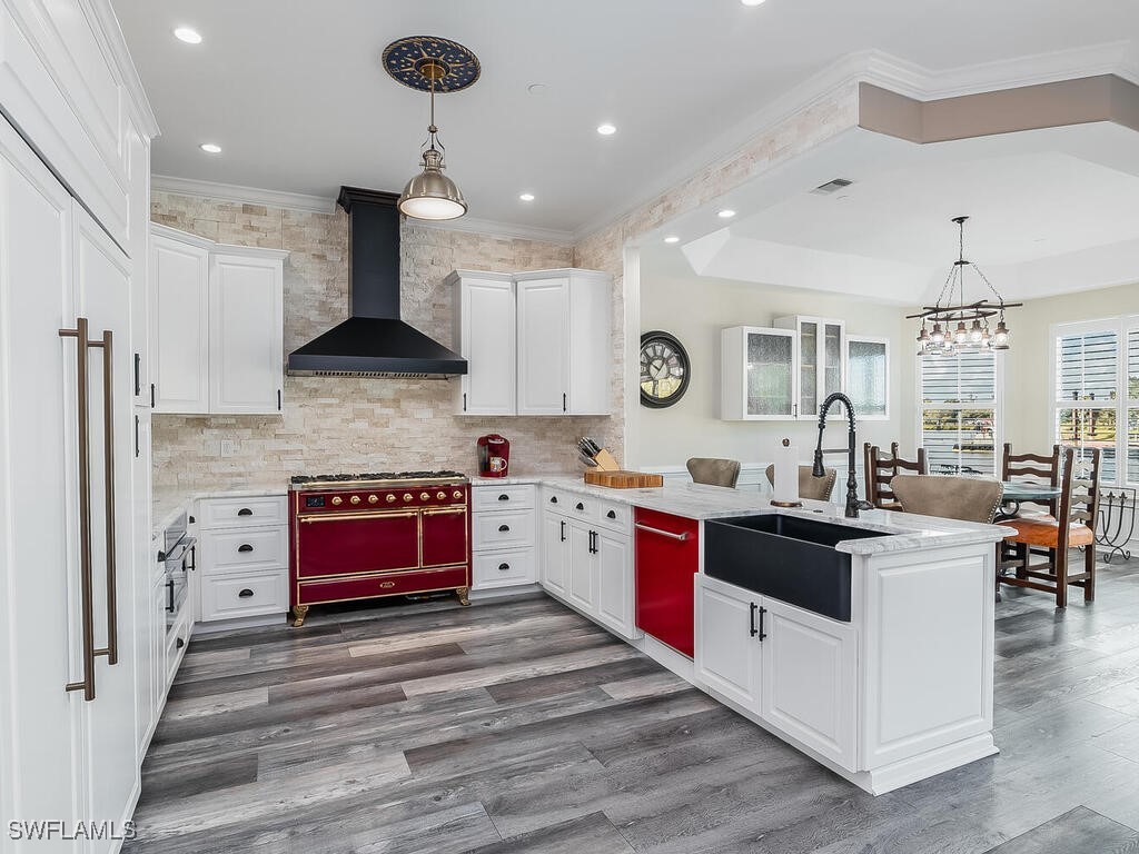 16410 Oakview Circle Alva, FL 33920 - Photo 7 of 39 a large kitchen with stainless steel appliances granite countertop a stove and a refrigerator