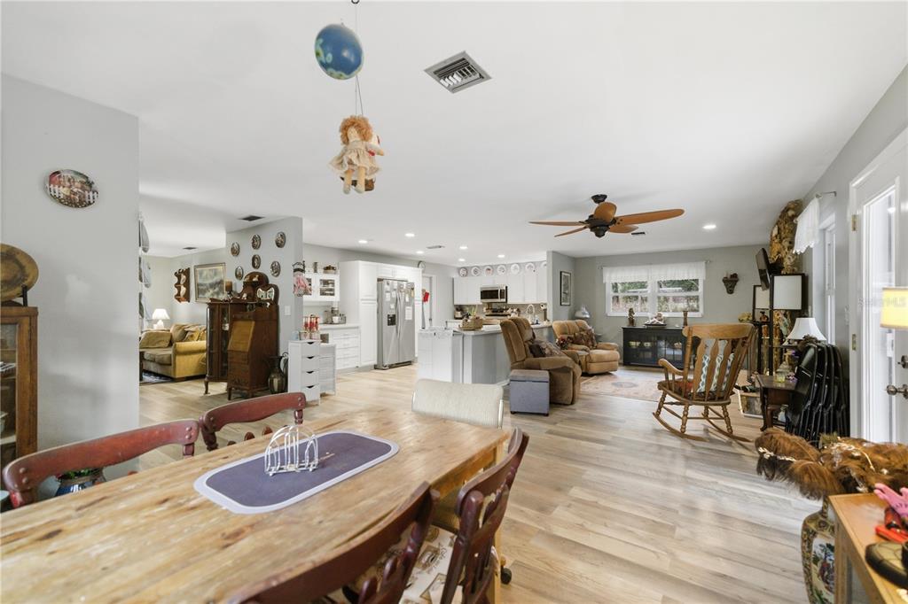 8951 Southwest 202nd Avenue Road Dunnellon, FL 34431 - Photo 14 of 38 a living room with furniture and wooden floor